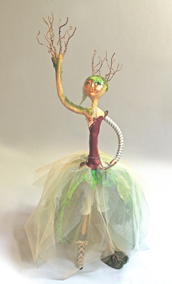 figurative art doll titled Mechanical Succession, experimentation in mixed media
