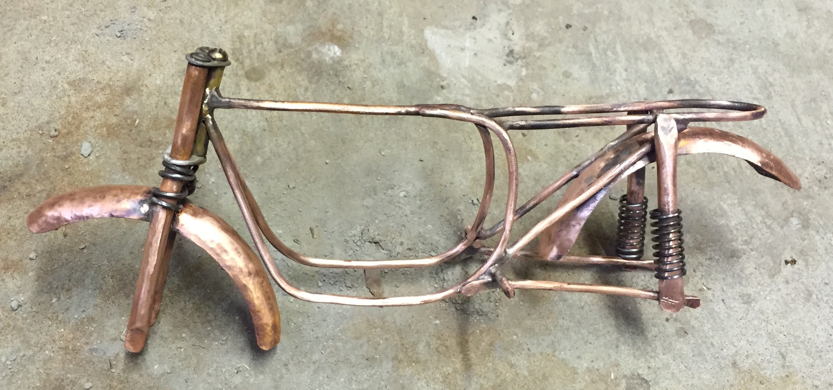 copper cycle frame with fenders and springs