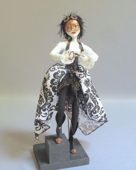 steampunk art doll titled The Key with custom stand