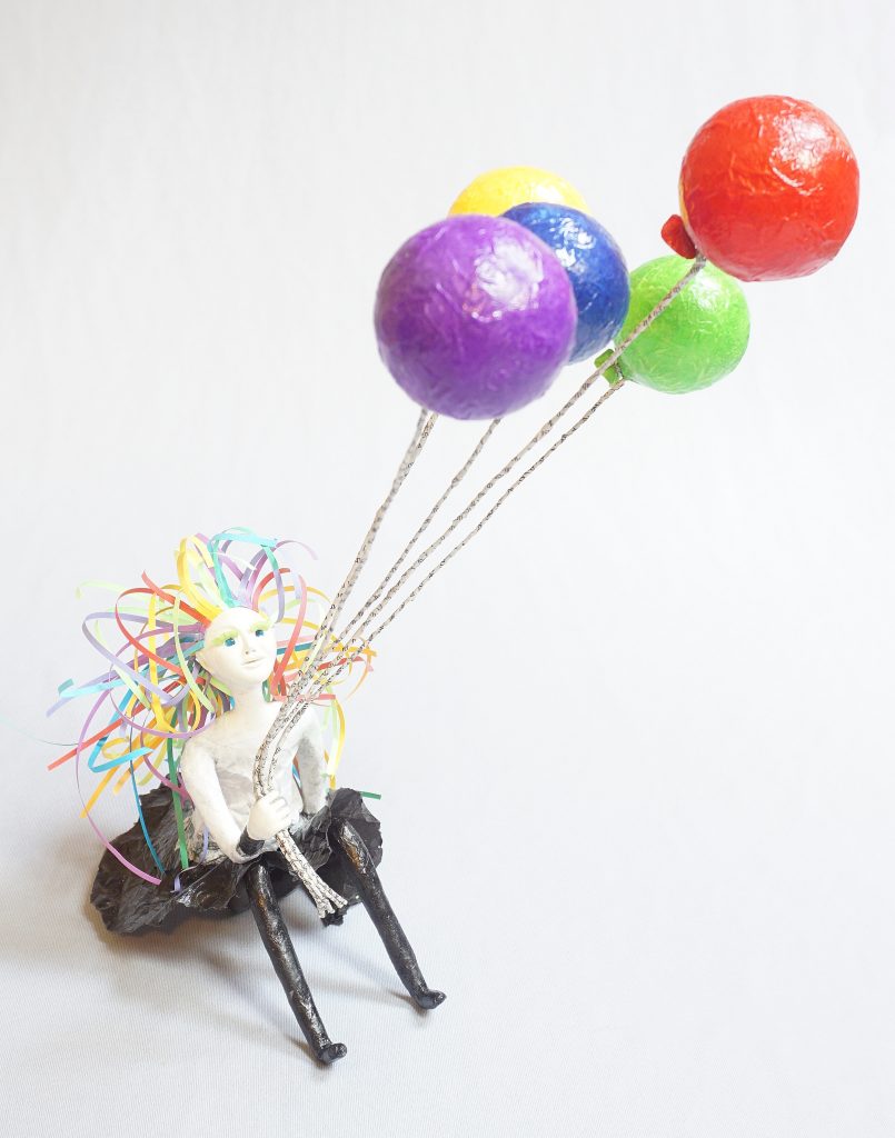 Hope- seated art doll figure sculpture with balloons