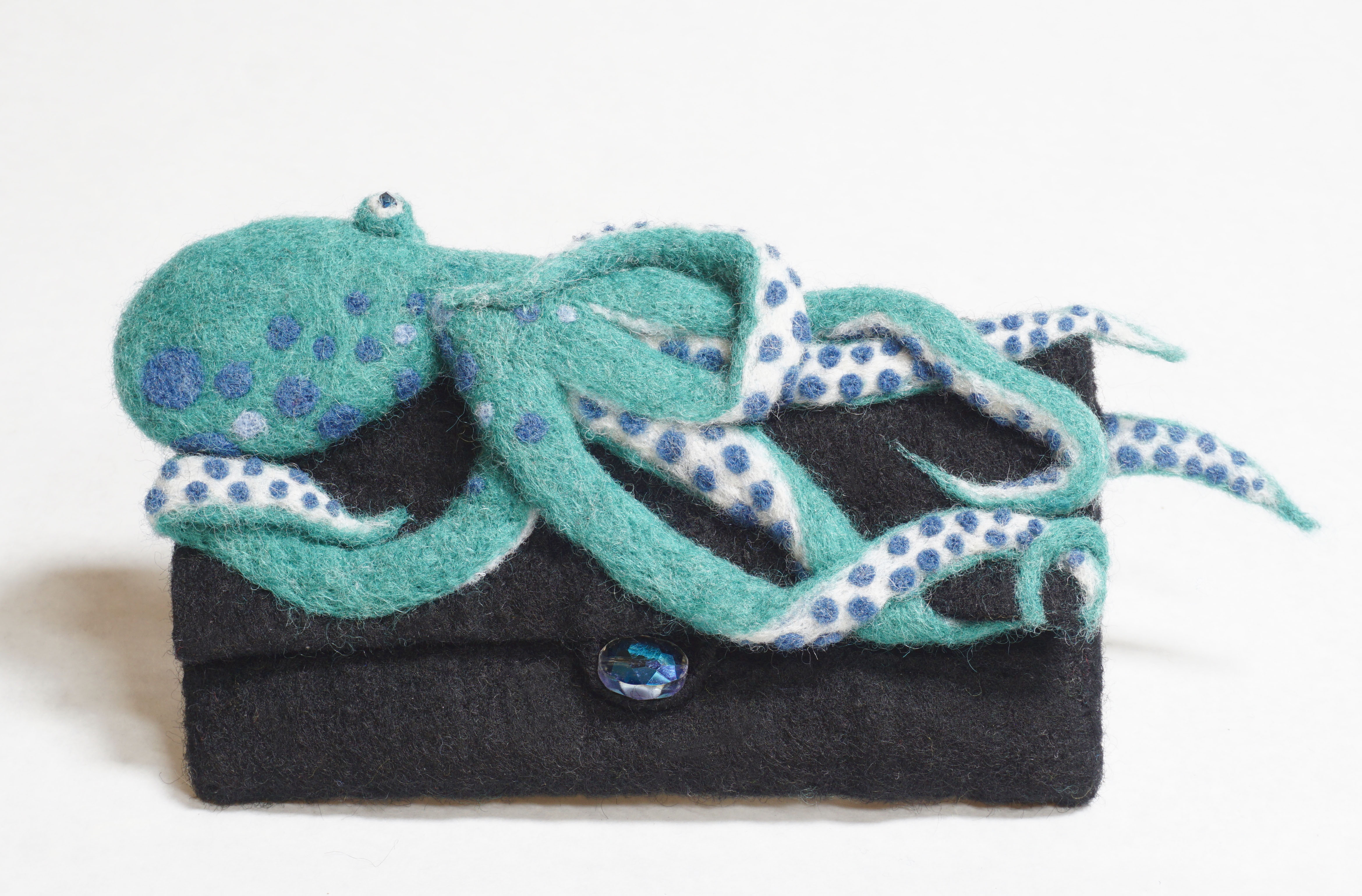 "Clutched" clutch bag with needle felted octopus is something different