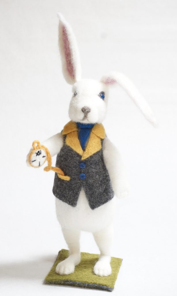 Alice is Late white rabbit figure sculpture