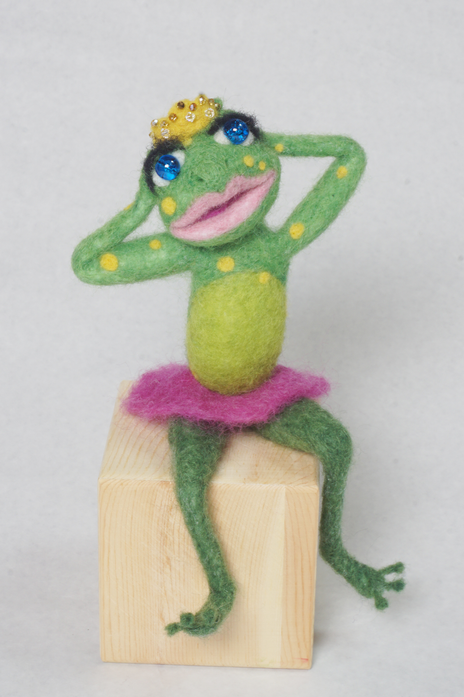 sculpture of an anthropomorphic frog princess.