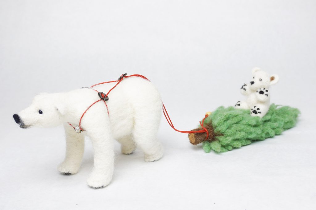 Happily Hauling. Anthropomorphic polar bear sculpture