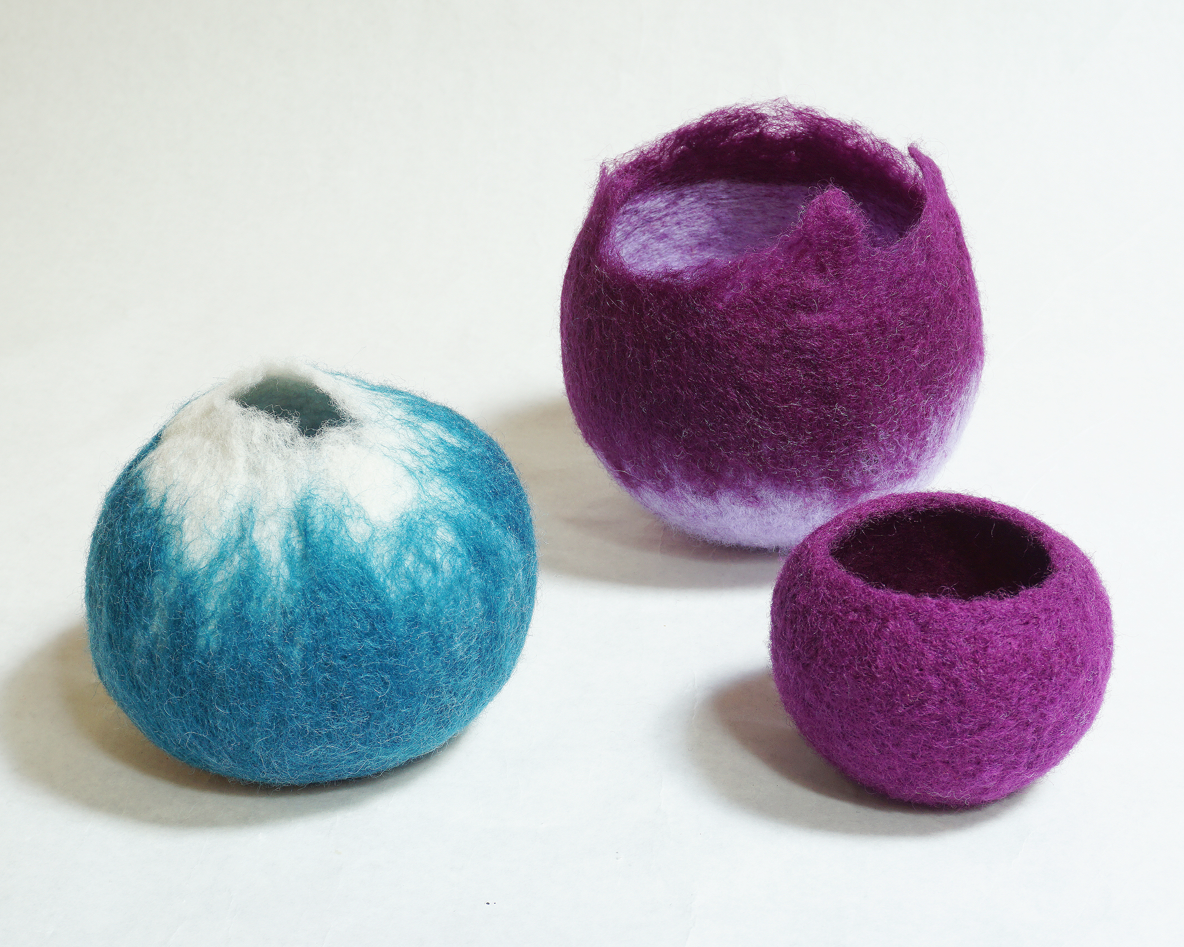Vessels created by wet felt techniques over balloon form