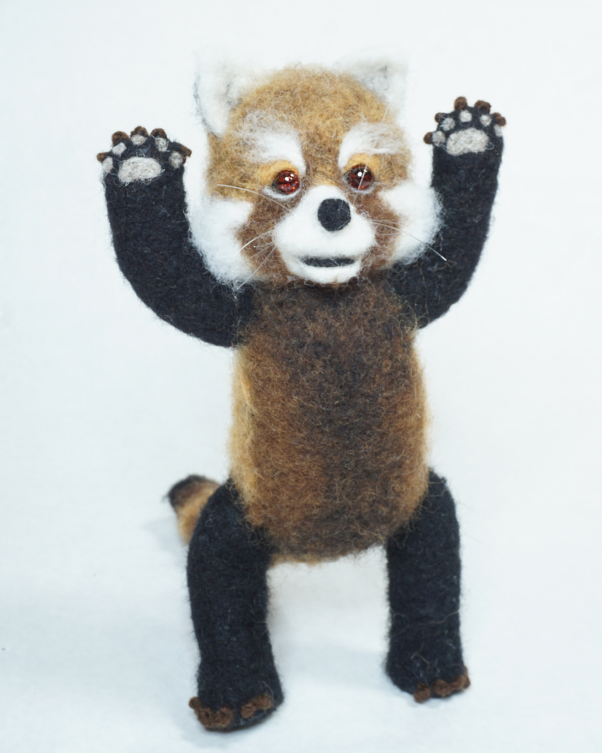 needle felted anthropomorphic red panda art doll figure sculpture attempting to be intimidating