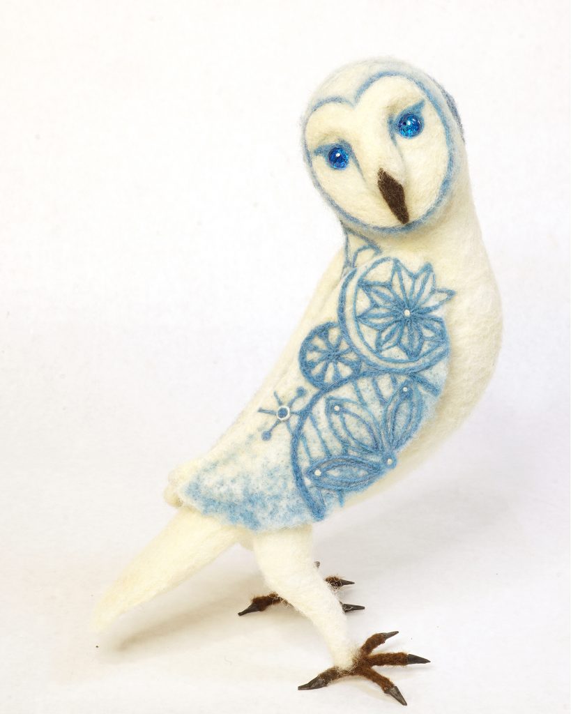 Owl sculpture white with blue patterning. Needle felted wool - wire and batting armature