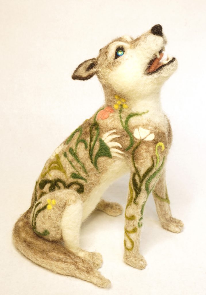needle felted howling wolf art doll figure sculpture with art nouveau inspired floral pattern, titled Loup Nouveau