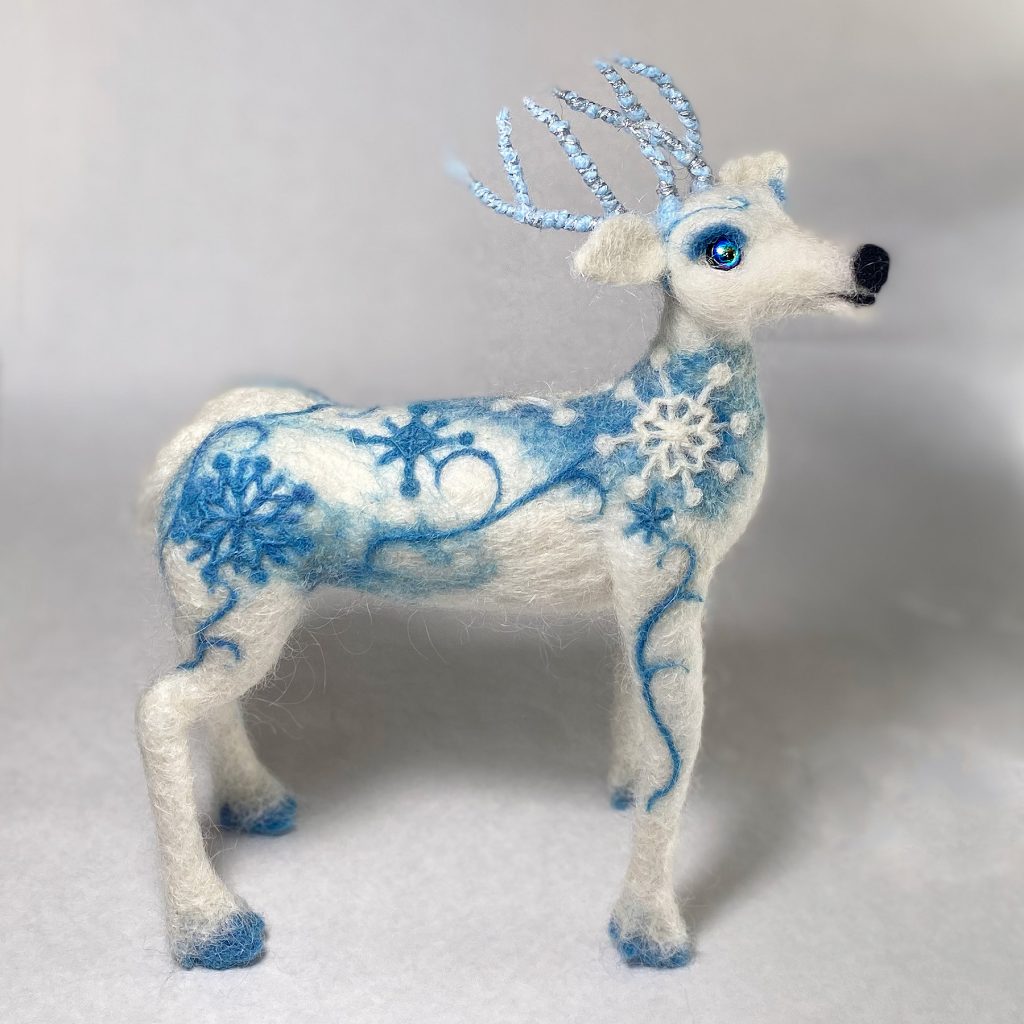 Winter Stag. Nordic patterned white stag sculpture. Needle felted wool over wire and batting armature