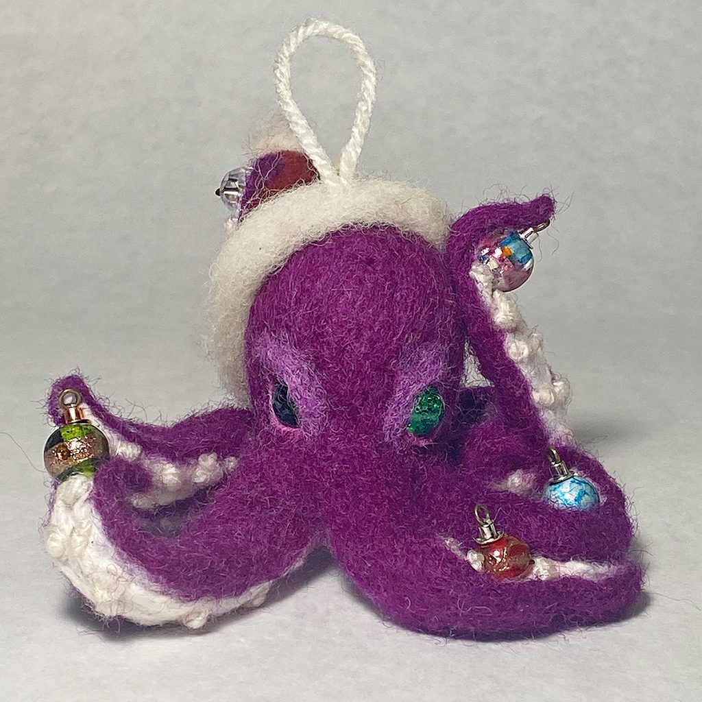 Cephalopoda adorno one-of-a-kind needle felted anthropomorphic octopus holiday ornament with glass bead "mino-ornaments" and Santa hat