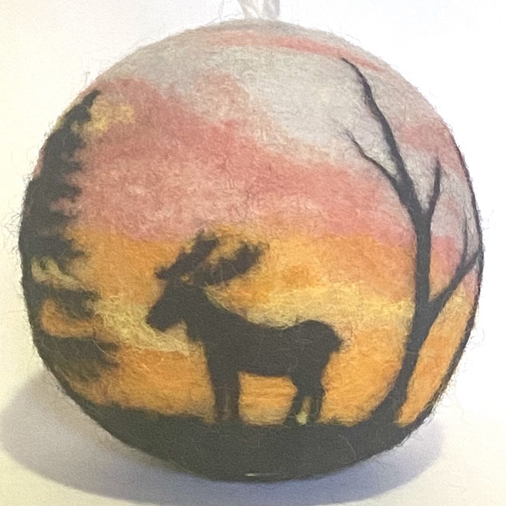 needle felted holiday ornament over wool dryer ball