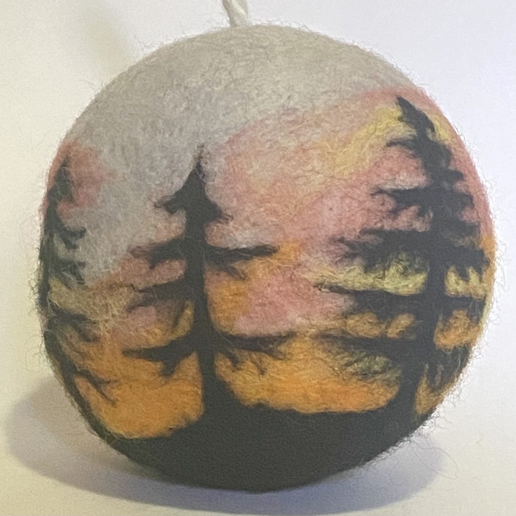 needle felted holiday ornament over wool dryer ball