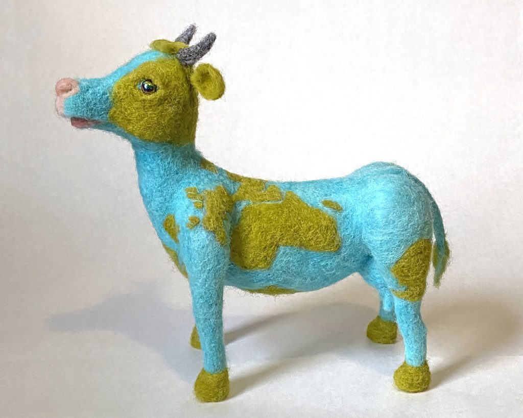 Gaia - Sacred Cow sculpture, needle felted wool over wire and batting armature with globe patterning
