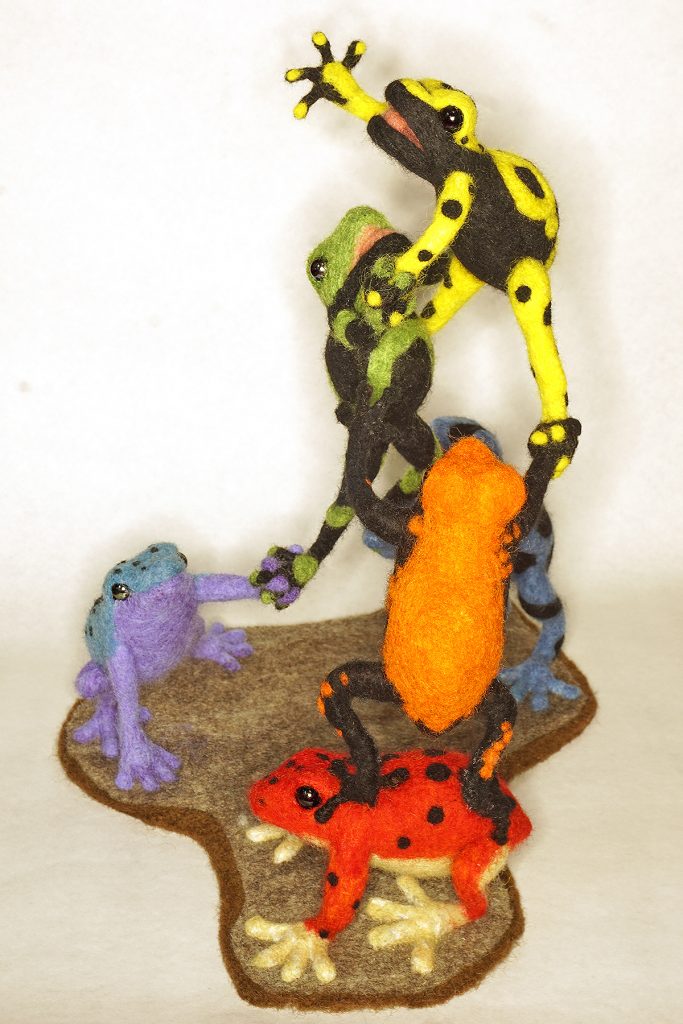 sculpture rainbow pyramid of anthropomorphic poison dart frogs in needle felted wool over wire and batting armature