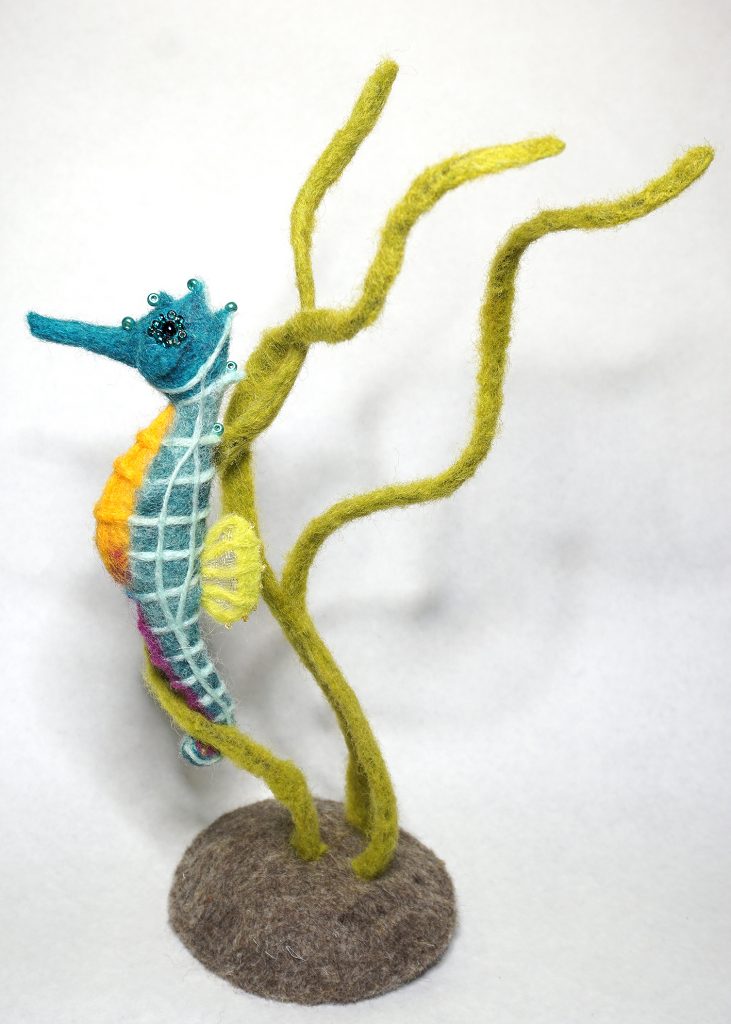 Needle felted seahorse in seagrass sculpture wool over wire armature with glass bead eyes and embellishments one of several sealife sculptures for Natural Patterns - Flora and Fauna